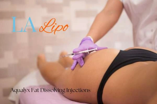Woman having fat dissolving injections Old Oak Common on thighs